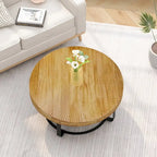 Table basse ronde naturelle et noire, plateau en bois sculpté, piètement en métal à 6 pieds