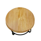 Table basse ronde naturelle et noire, plateau en bois sculpté, piètement en métal à 6 pieds